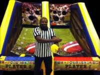 Inflatable football toss two player game rental