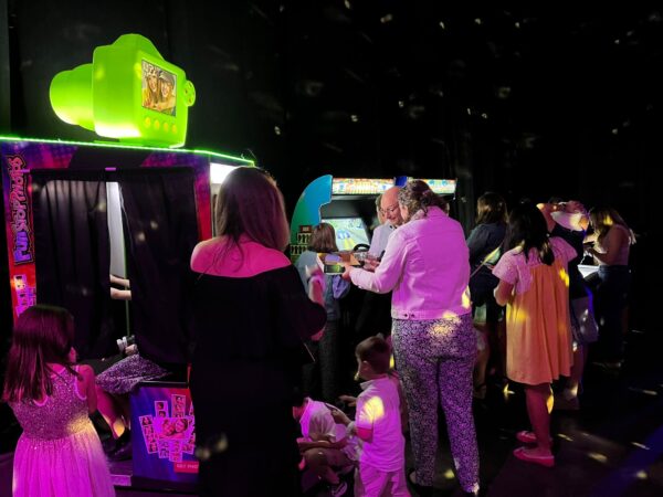 funstop photo booth with custom branding for a Tron arcade 80's theme